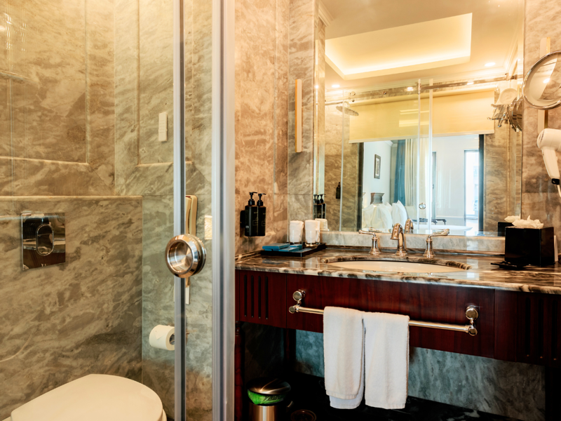 Deluxe Room Pool View Bathroom at Ramada By Wyndham Vagator