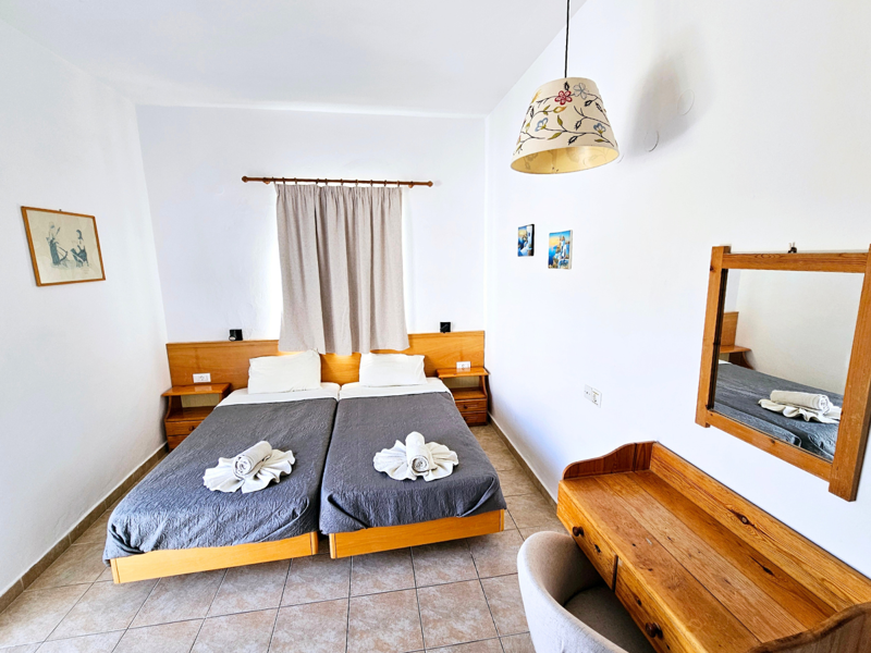 One Bedroom Apartment Bedroom at Eleni Apartments