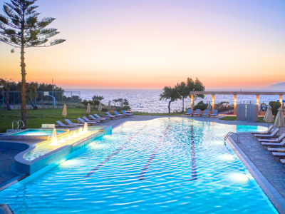 Sunset View of Swimming Pool at Ammos Luxury Resort