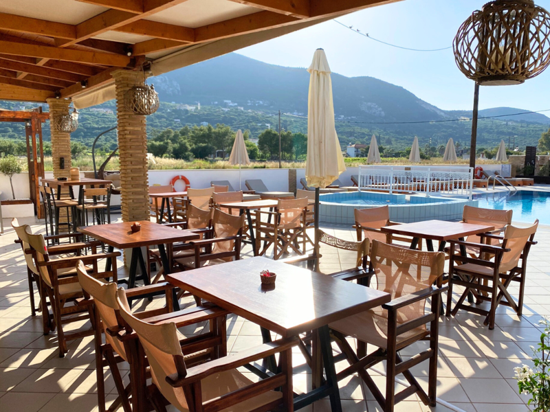 Dining by the Pool at Roula Apartments